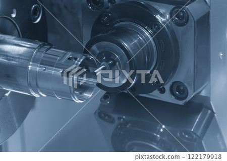 The CNC lathe machine milling the metal tube parts by milling spindle. The CNC lathe machine milling the metal tube parts by milling spindle. 122179918