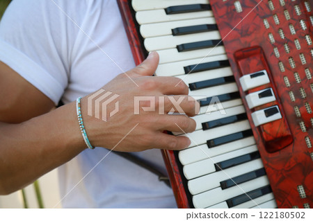Joyful Melodies Flowing from Accordion Player Joyful Melodies Flowing from Accordion Player 122180502