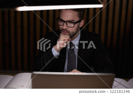 Thoughtful business man at his work place 122181246