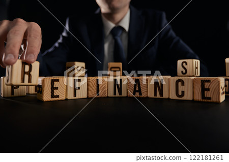 Refinance. Cubes form the word Refinance. Business concept of the word Refinance Refinance. Cubes form the word Refinance. Business concept of the word Refinance 122181261