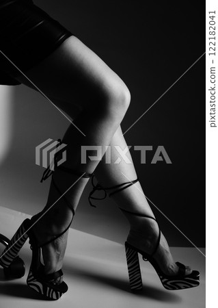Sexy female model long legs and high heels Sexy female model long legs and high heels 122182041
