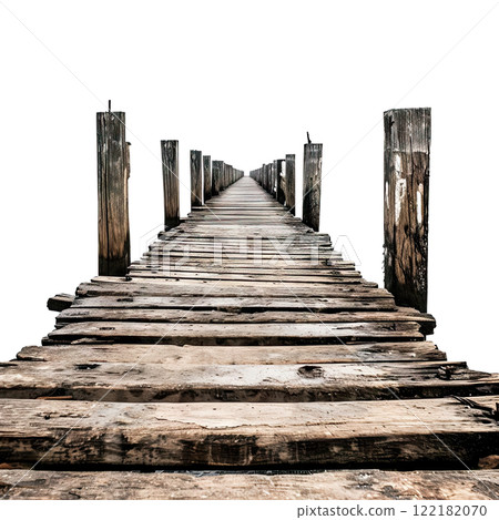 An old wooden pier extends into the water An old wooden pier extends into the water 122182070