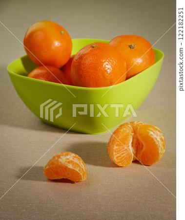 Tangerines and green bowl 122182251