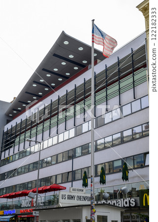 Checkpoint Charlie, famous Berlin Wall crossing point between East and West Berlin during the Cold War, in Berlin, Germany Checkpoint Charlie, famous Berlin Wall crossing point between East and West Berlin during the Cold War, in Berlin, Germany 122182333