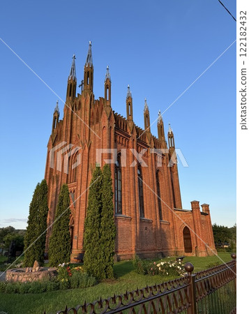 Historic Red Brick Neo-Gothic Church in Evening Light 122182432
