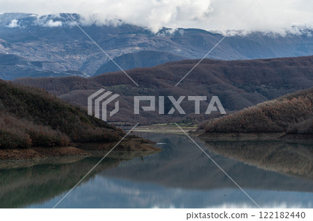Mountain reflections in the Boivlla lake, Albania Mountain reflections in the Boivlla lake, Albania 122182440