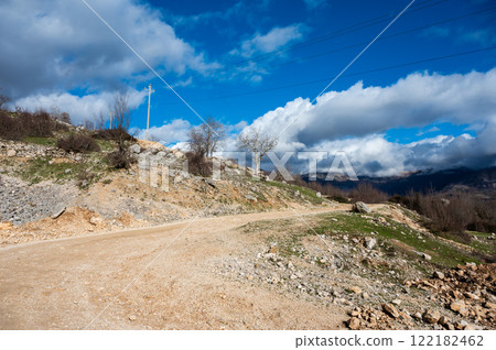 Swirling gravel road at the Gamti mountain near Bovilla lake, Albania 122182462