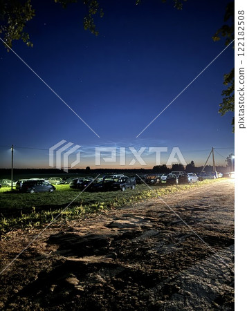 Night Sky Over Rural Parking Lot with Twilight Glow Night Sky Over Rural Parking Lot with Twilight Glow 122182508