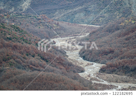 Erosion of a dried out river in the Gamti mountains Erosion of a dried out river in the Gamti mountains 122182695