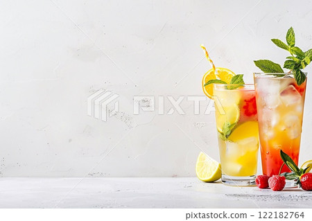 Glasses with summer tropical and exotic cocktail glasses on light sunny background.AI Generative. 122182764