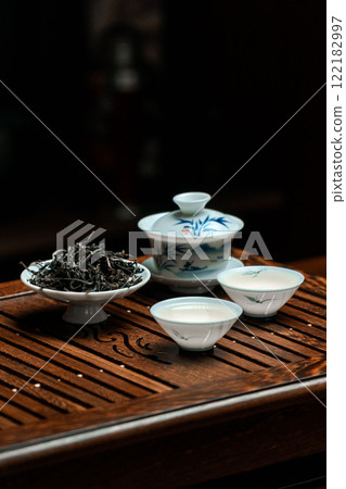 A traditional Chinese tea ceremony setup beautifully showcasing exquisite teaware and accessories A traditional Chinese tea ceremony setup beautifully showcasing exquisite teaware and accessories 122182997
