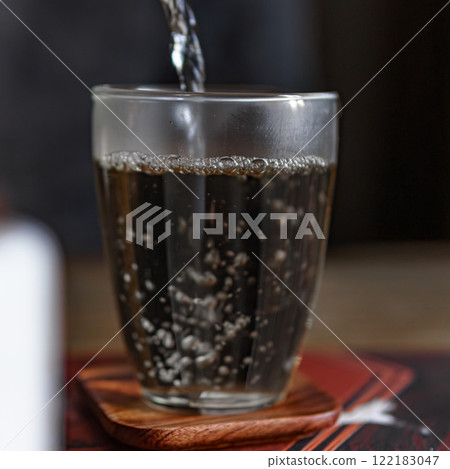 A Refreshingly Bubbly Drink Served in a Beautiful Glass for Your Enjoyment and Delight 122183047