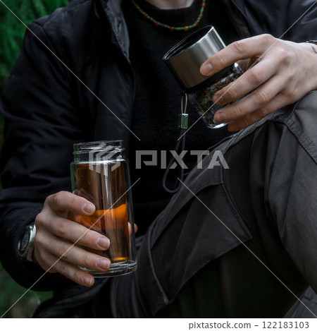 Enjoying hot beverages amidst natures beauty a truly serene and peaceful moment to cherish 122183103