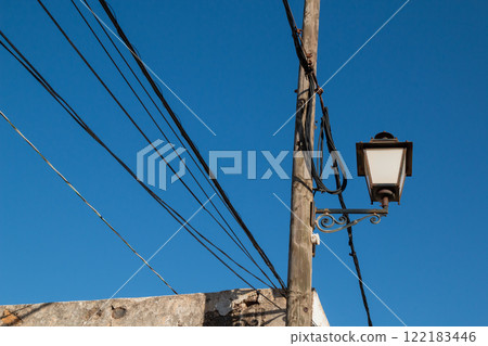 Lantern on a wooden pole, Lanzarote, Spain 122183446