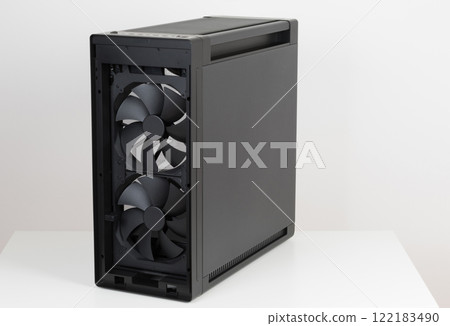 Two  pre-installed system extra-thick 200 x 38 mm front fans for maximum air intake. Front panel IR dust indicator. Side view of empty big tower, PC case, chassis. 122183490