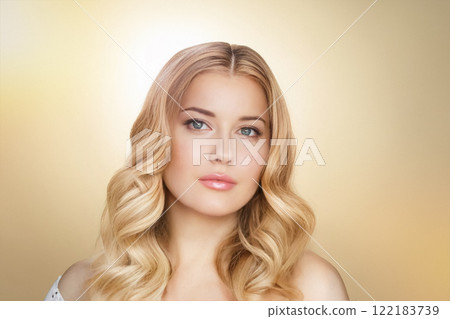 Woman, beauty and elegance, golden background and soft curls. Blonde beautiful woman, flawless skin and glowing confidence, fashion and glamour idea Woman, beauty and elegance, golden background and soft curls. Blonde beautiful woman, flawless skin and glowing confidence, fashion and glamour idea 122183739