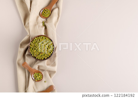 Protein-rich mung beans in a wooden bowl, banner 122184192