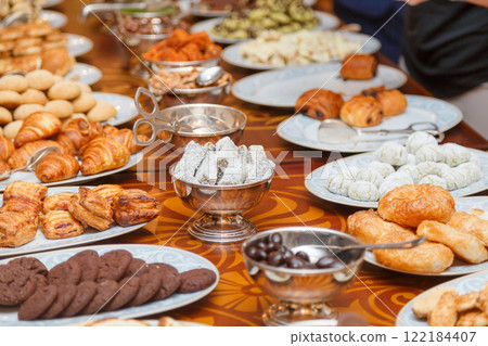 Traditional turkish desserts or local cuisine cultural tribe food on table for serve customers people taste eat and tasty drink in restaurant 122184407