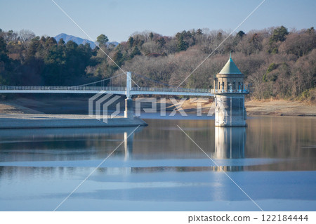 Water intake tower seen from Lake Sayama dam in winter 122184444