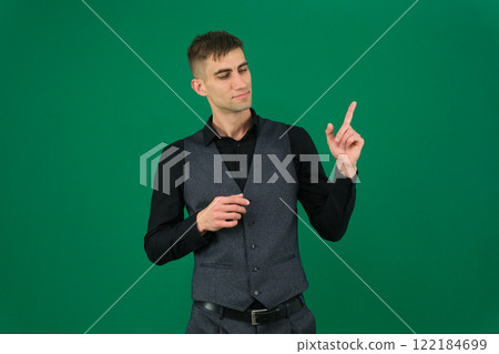Portrait of a successful man holding something on the palms of the hands, isolated on a gray background 122184699