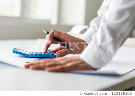 Closeup of engineer or architect working Closeup of engineer or architect working 122186106