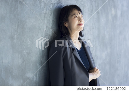Middle-aged woman in a suit Middle-aged woman in a suit 122186902