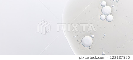 The texture of a skin serum or body gel or a moisturizing cosmetic cream. Copy space. 122187530