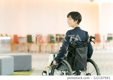 Female wheelchair user in suit Female wheelchair user in suit 122187981