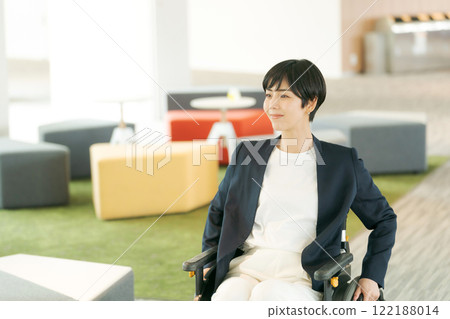 Female wheelchair user in suit 122188014