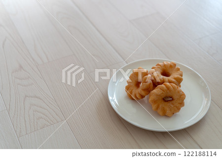 Donut on a white plate Donut on a white plate 122188114