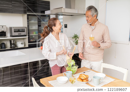 Senior couple cooking Senior couple cooking 122189607