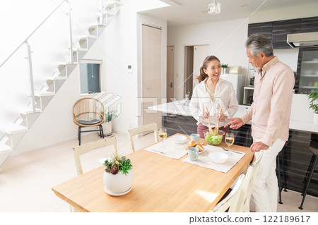 Senior couple cooking Senior couple cooking 122189617