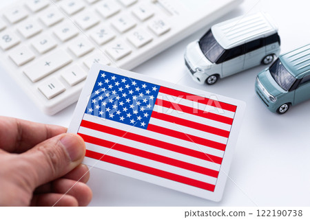 American flag, calculator and Japanese car 122190738