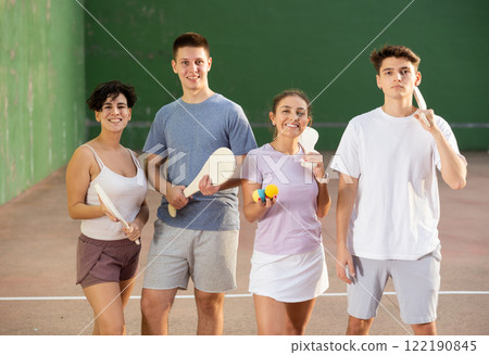 Group photo of Basque pelota players outdoors 122190845