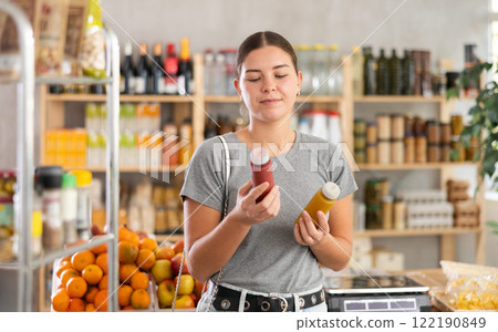 Woman choosing smoothie 122190849