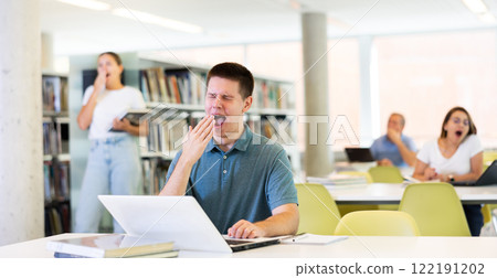 View on bored young male student 122191202
