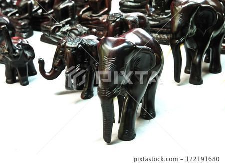 wooden elephant on a white background wooden elephant on a white background 122191680