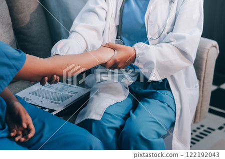 Physician consulting patients about shoulder pain problems ,office syndrome problems, physiotherapy diagnosis conc Physician consulting patients about shoulder pain problems ,office syndrome problems, physiotherapy diagnosis conc 122192043
