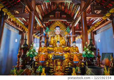 Buddhist golden Buddha statue in a pagoda temple in Nha Trang, Asia. Vietnam 122192154