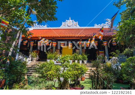 View of Tu Ton Pagoda in Nha Trang. Buddhist temple on an island in the middle of the sea View of Tu Ton Pagoda in Nha Trang. Buddhist temple on an island in the middle of the sea 122192161