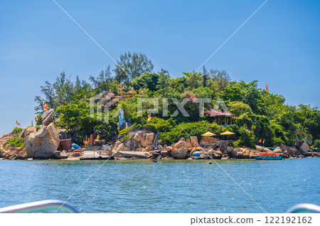 View of the Tu Ton Pagoda Island in Nha Trang. Buddhist temple on an island in the middle of the sea 122192162