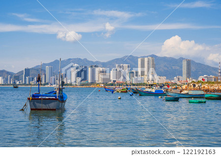 Panoramic daytime view of Nha Trang city, Vietnam. Fishing boats at sea 122192163