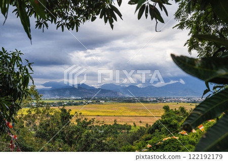top view of rice fields with villages against background of mountains in Vietnam in Asia 122192179