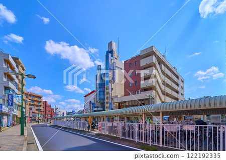 From the south exit of Mukogaoka-Yuen Station in Tama Ward, Kawasaki City, Kanagawa Prefecture, heading southeast from the bicycle parking area on the street in front of the station 122192335