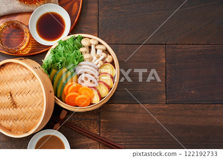 Colorful vegetables steamed in a bamboo steamer, a healthy Japanese dish 122192733