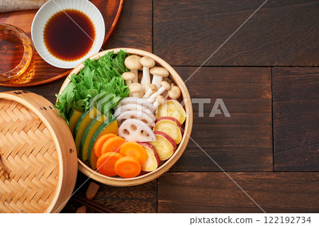 Colorful vegetables steamed in a bamboo steamer, a healthy Japanese dish 122192734