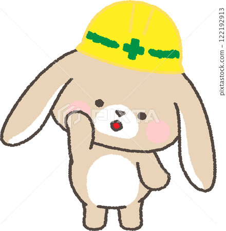 A droopy-eared rabbit wearing a helmet tilting its head 122192913