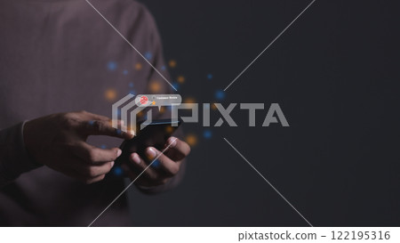 Young man hand holding smartphone to review and gives 1 star, with poor service results, Bad review Young man hand holding smartphone to review and gives 1 star, with poor service results, Bad review 122195316