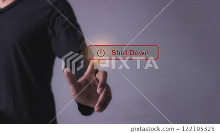 Young man hand touching Shut Down button press power OFF Young man hand touching Shut Down button press power OFF 122195325