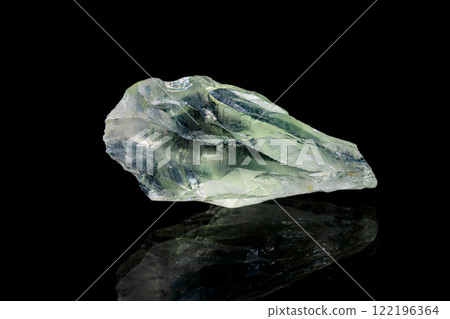 Prasiolite gemstone on dark background 122196364